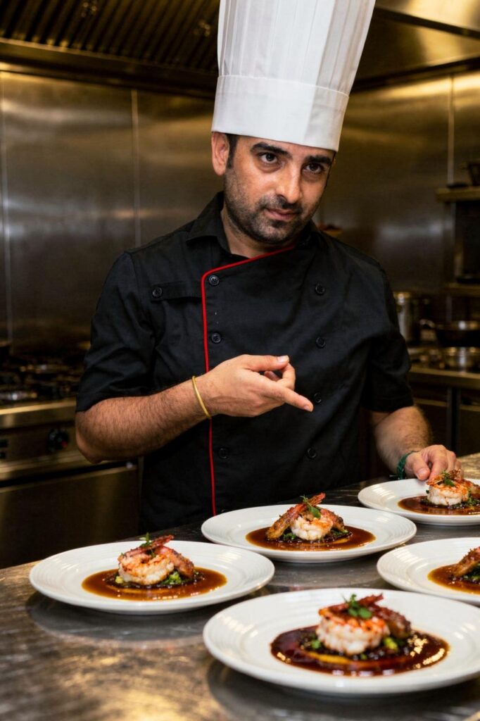 Cafe Avaia chef preparing food in the kitchen